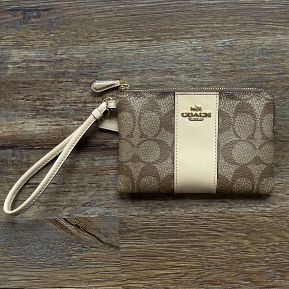 Coach Handbags - NWOT Coach Cream Leather Trim & Khaki/Tan Signature Monogram Canvas Wristlet